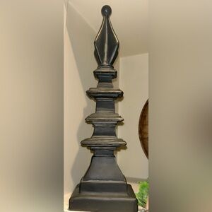 Decorative Finial shelf sitter. Black/dark gray. Approximately 13 inches tall.